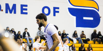 Gurdeep Kalsi in a stance after scoring a bucket