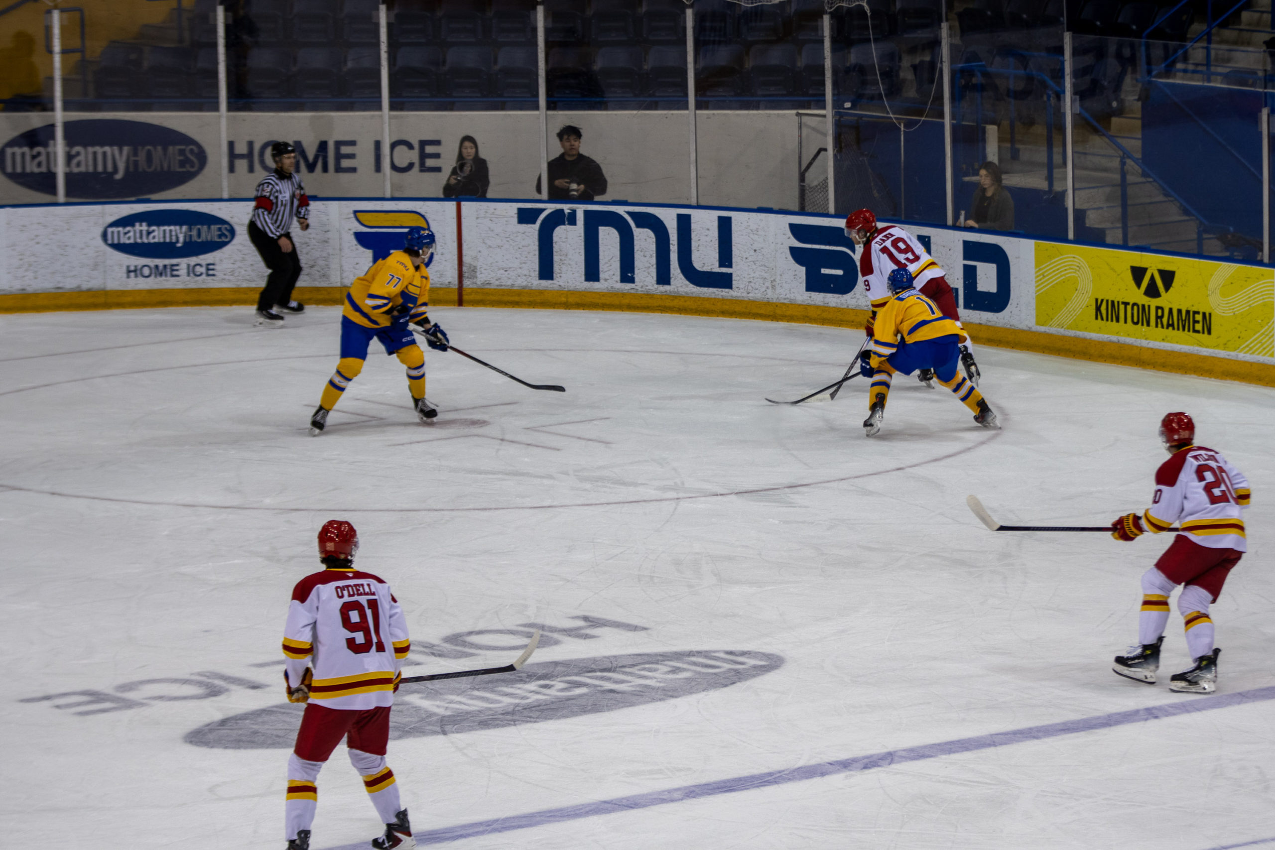 TMU tries to gain possession