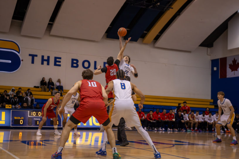 TMU tries gaining possession