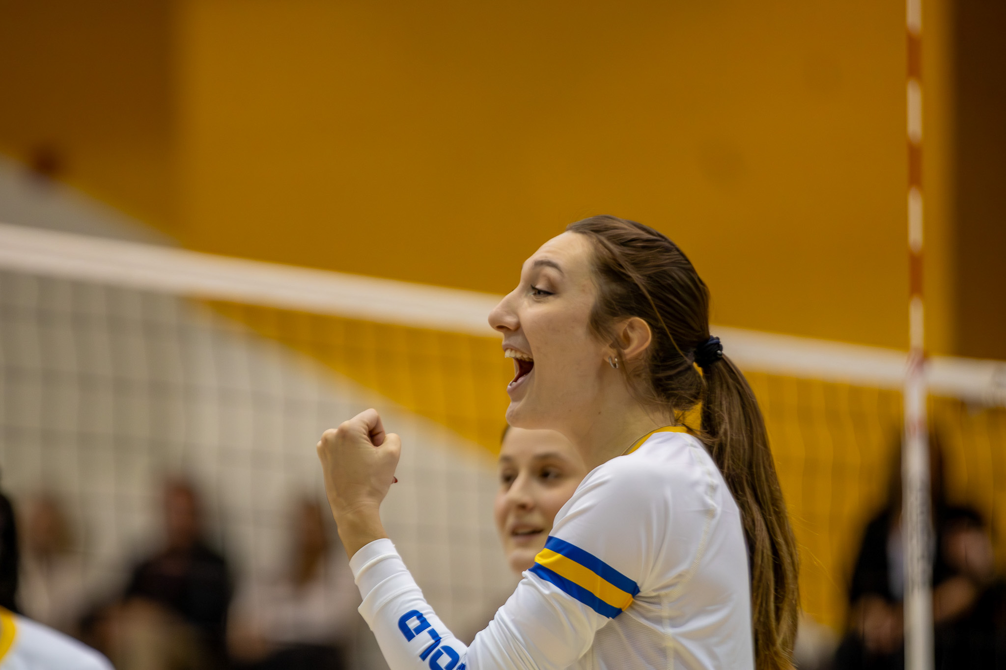 TMU women's player celebrated a play