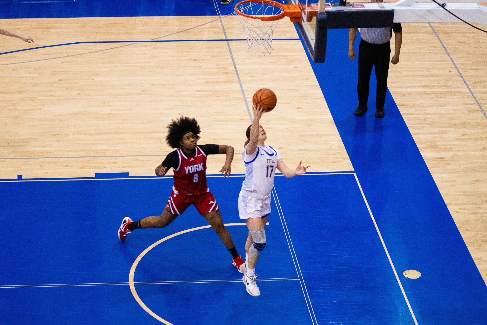 Catrina Garvey going for a reverse right hand layup at the Mattamy Athletics Centre