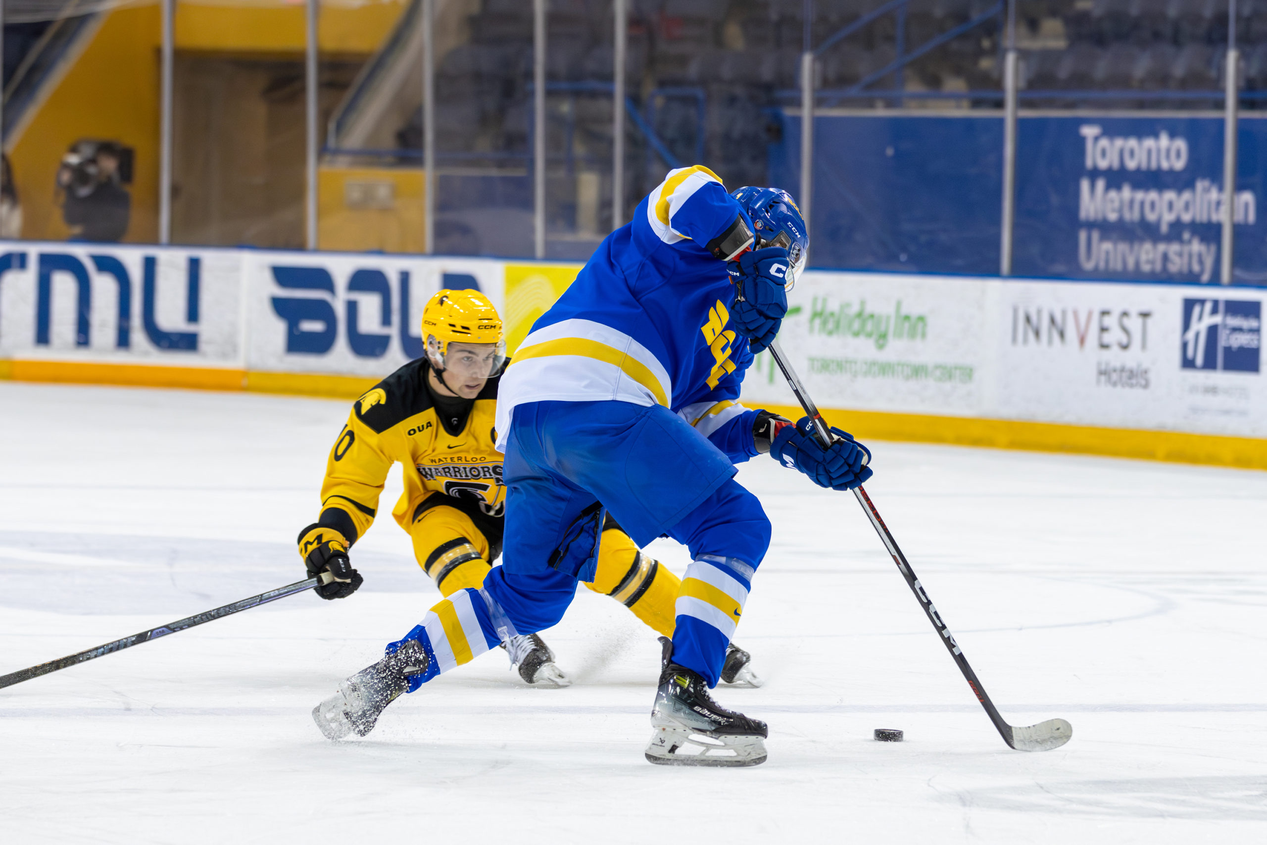 TMU tries to gain possession