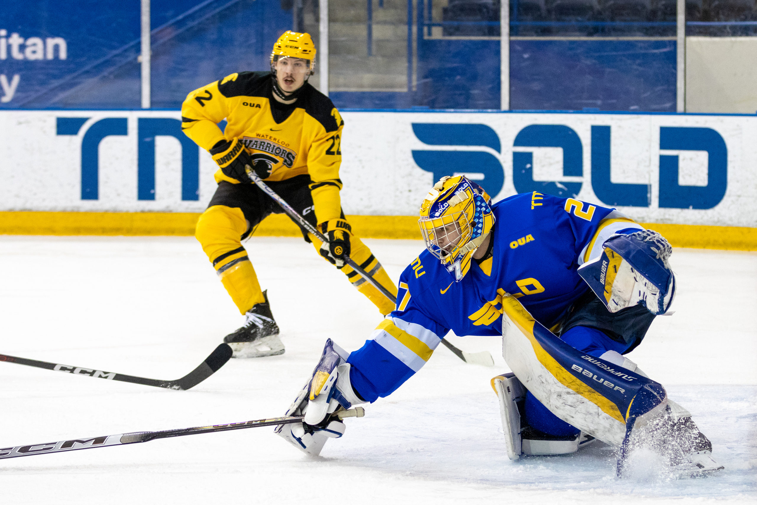 Kai Edmonds tries to grab the puck