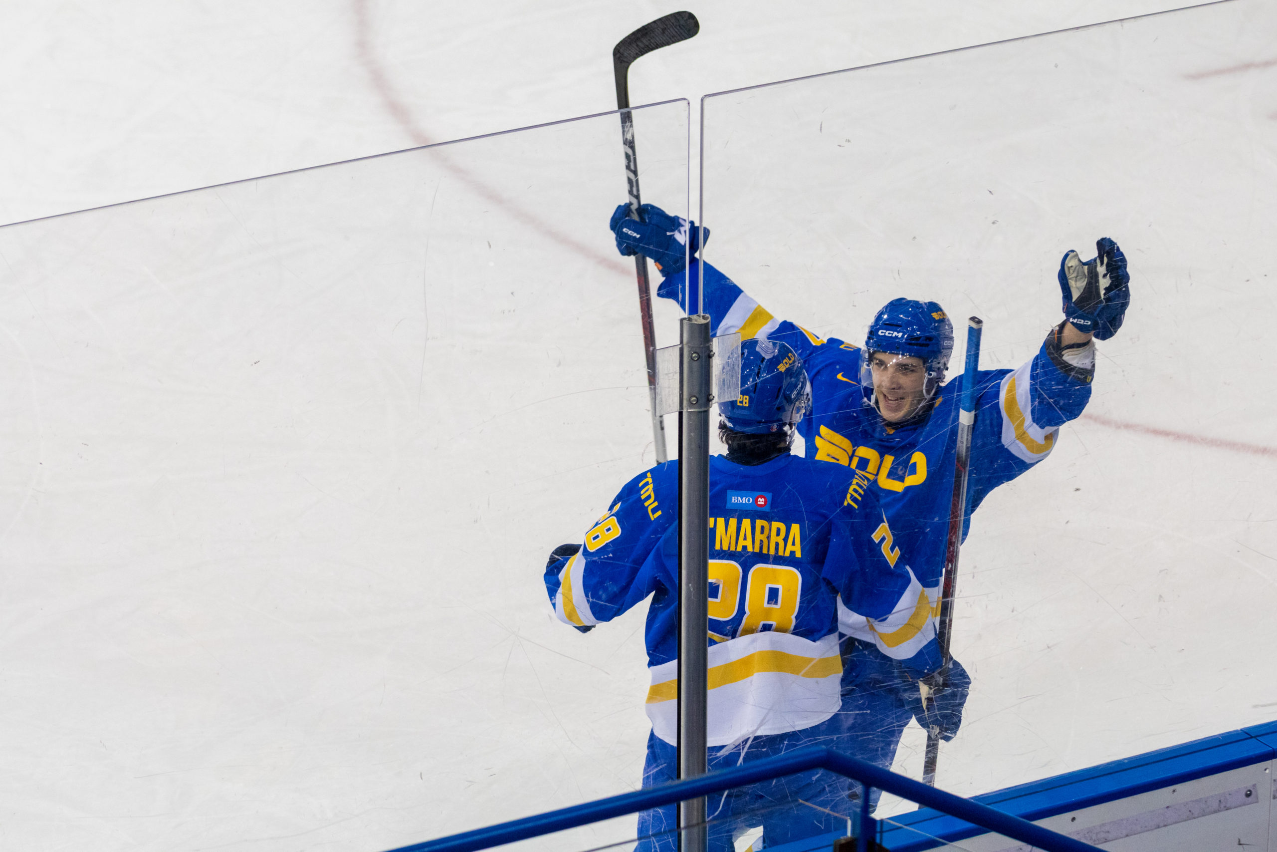 Adam O'Marra and Chase Lefebvre celebrate a goal