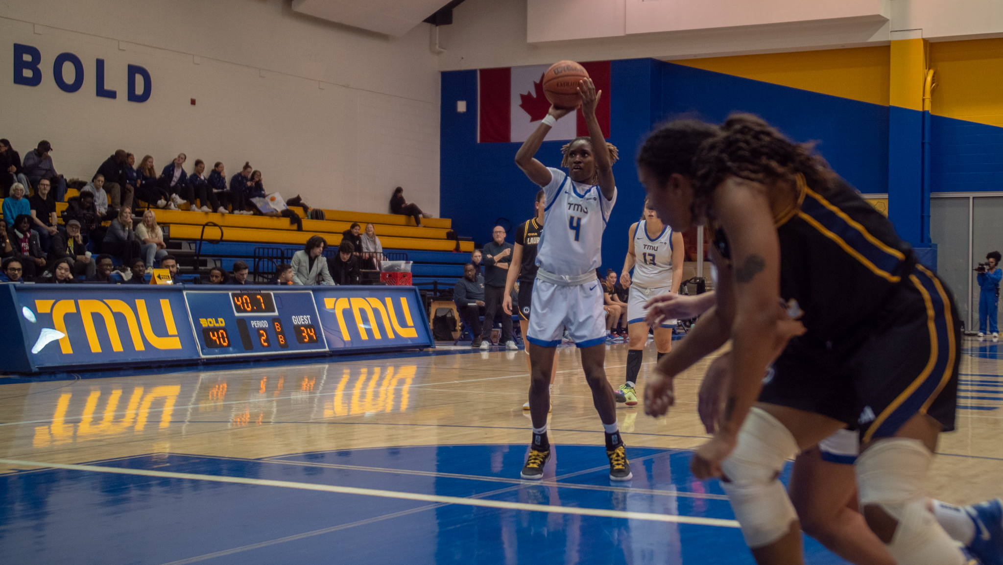 Myriam Koné makes a shot