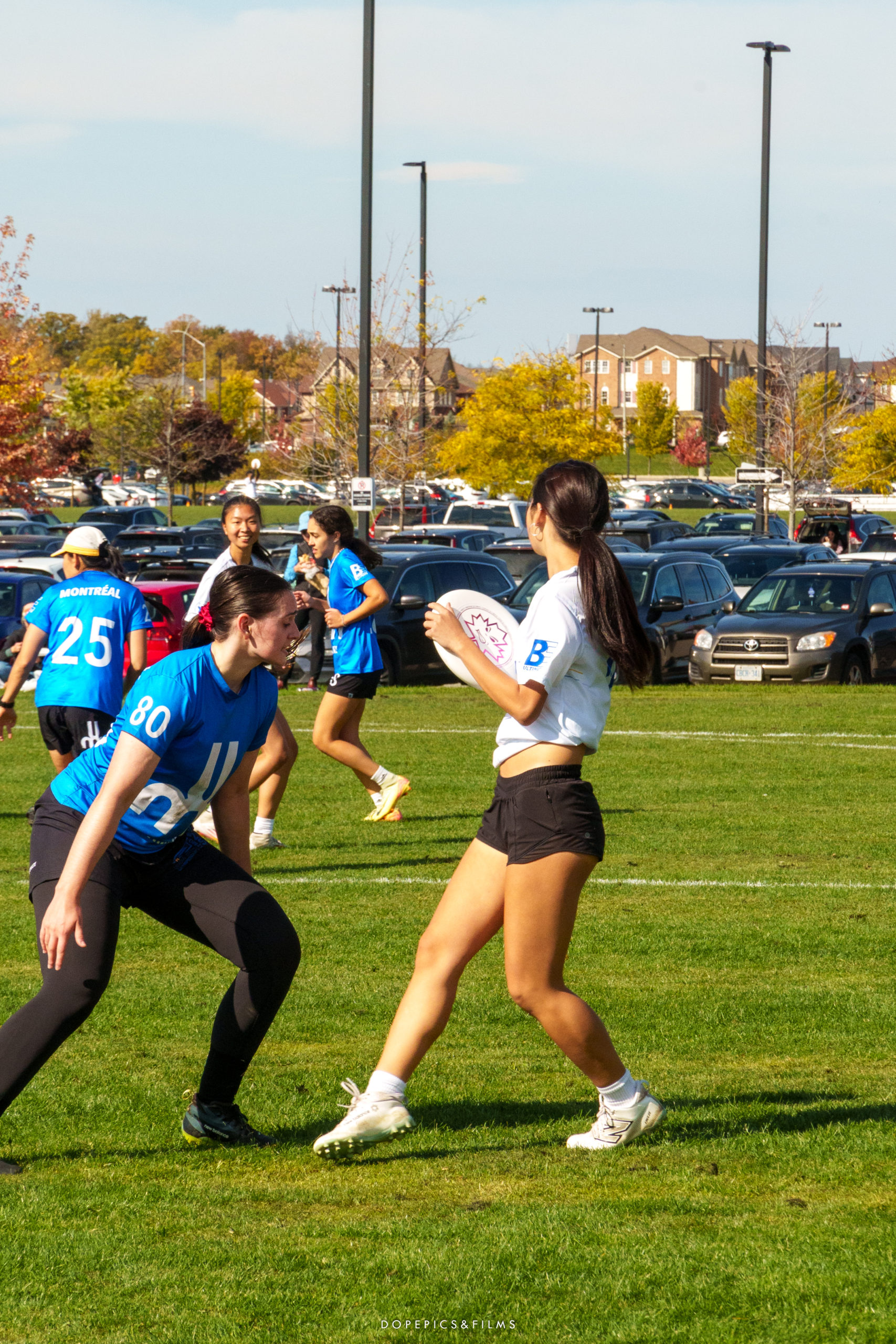 A frisbee player maintains possession