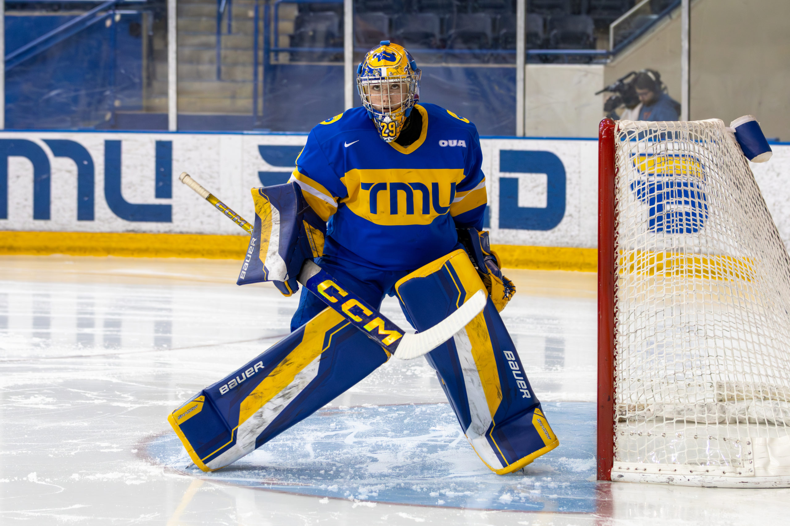 Sydney Pyburn with in a standing defensive in front of the net at the Mattamy Athletics Centre