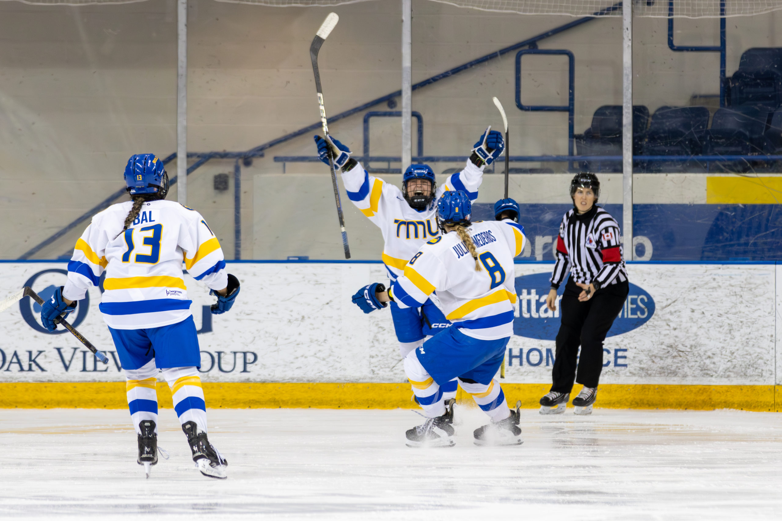 TMU celebrates a goal