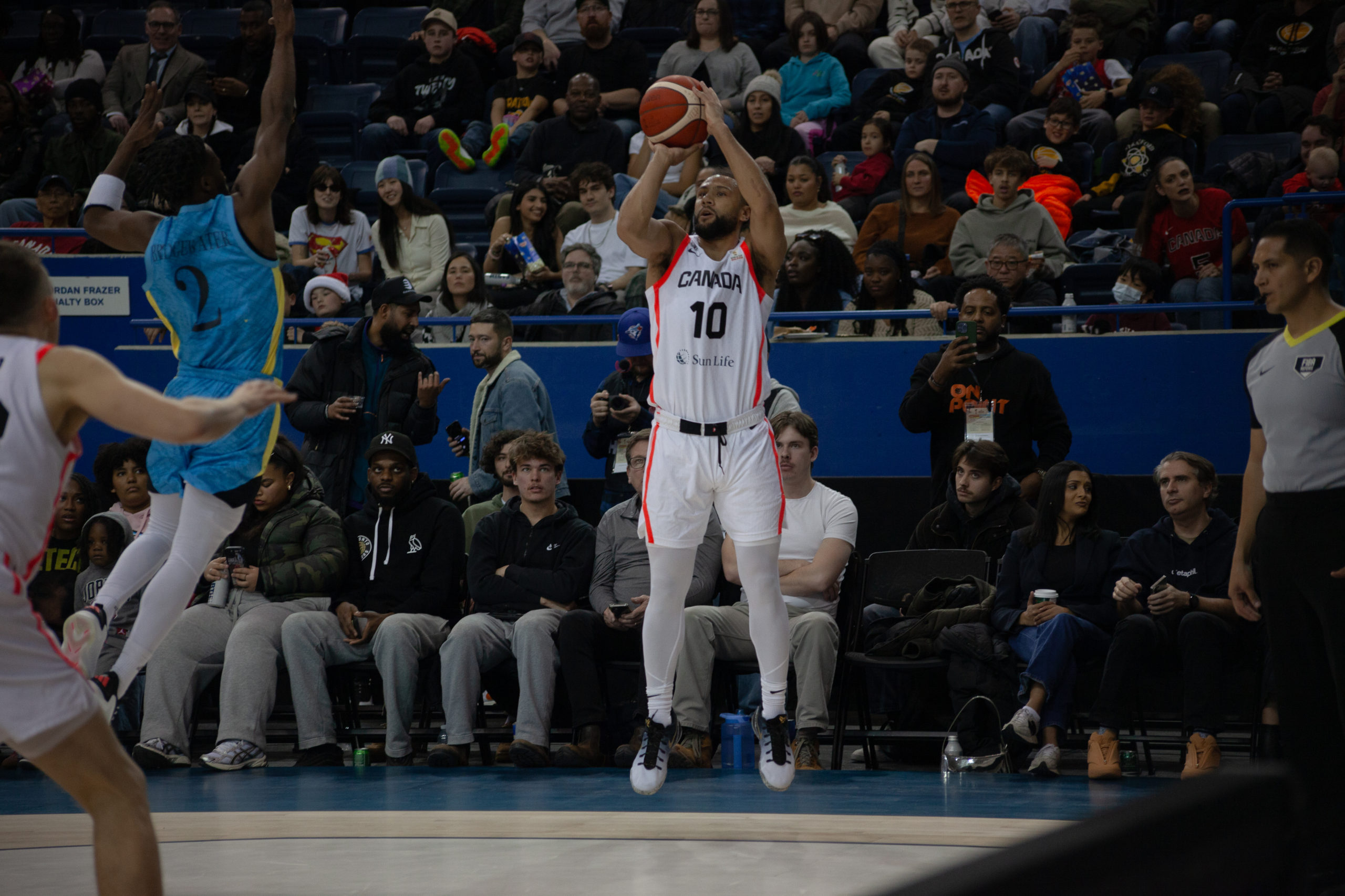 Kaza Kajami-Keane attempting a corner three point shot
