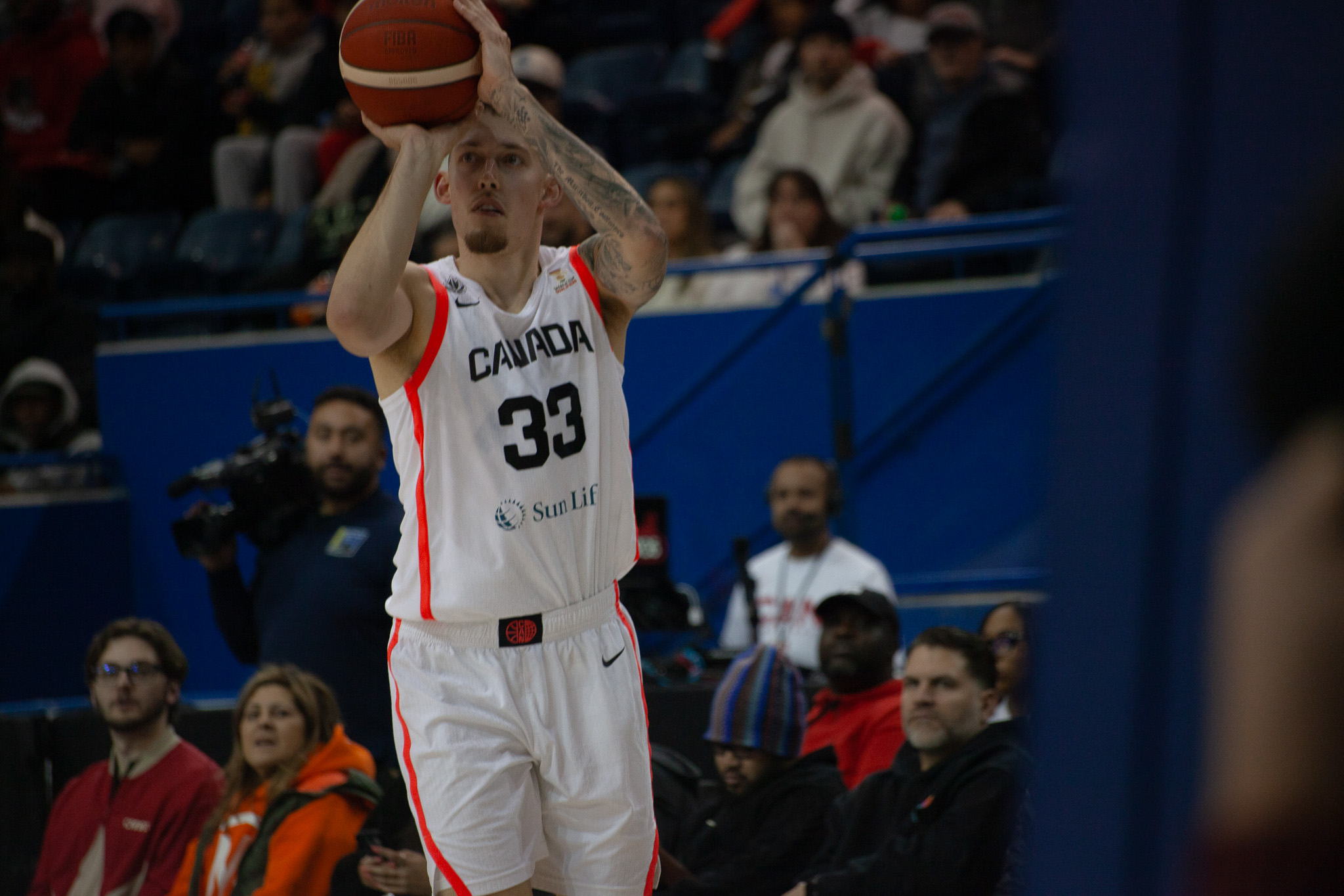 Kyle Wiltjer attempting a corner three point jump shot at the Mattamy Athletic Centre