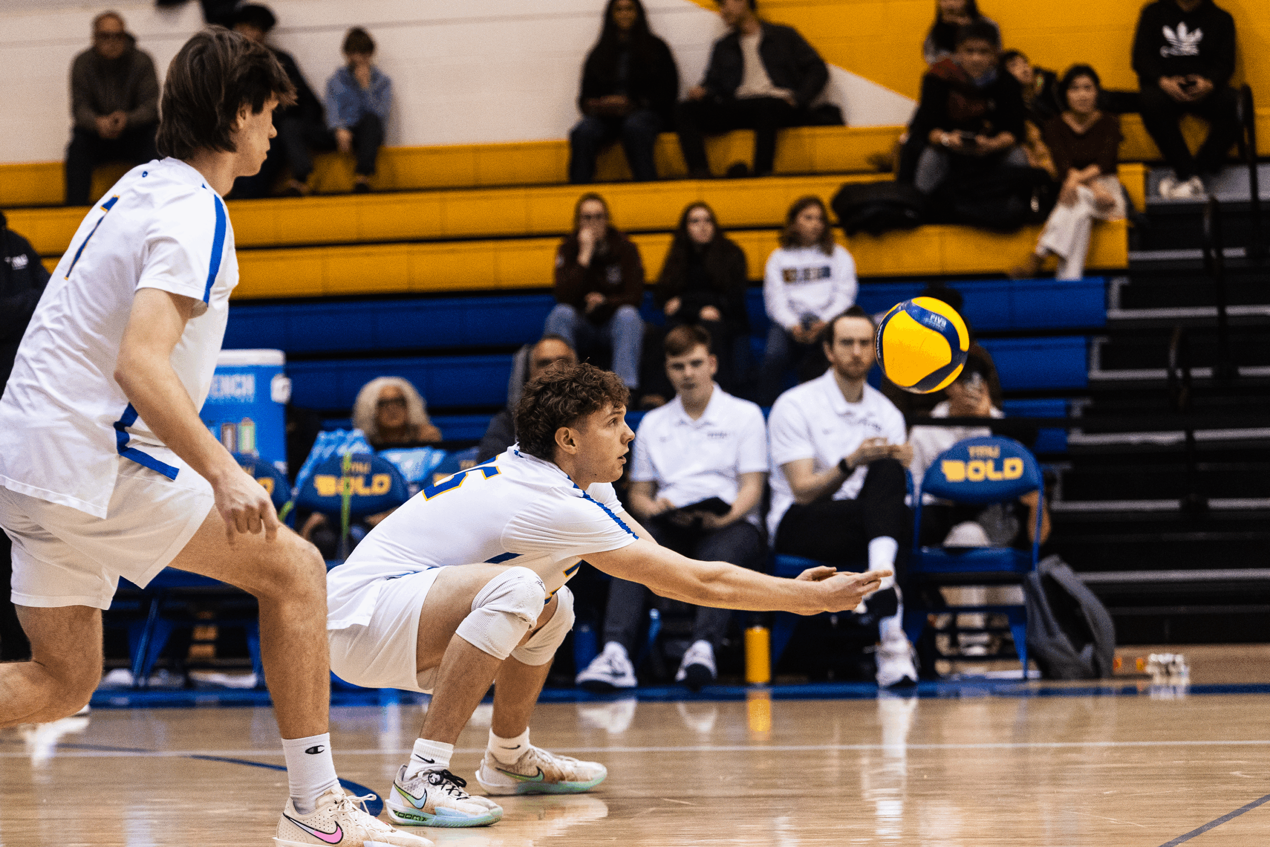 A TMU player receives the ball