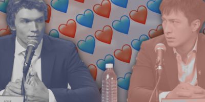 A graphic features an image two men in suits at a press conference with a blue and red gradient casted over them, and hearts in the background.