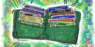 Photo of a green wallet on a multi-colored background with 11 cards of various colors which read "AMEX".