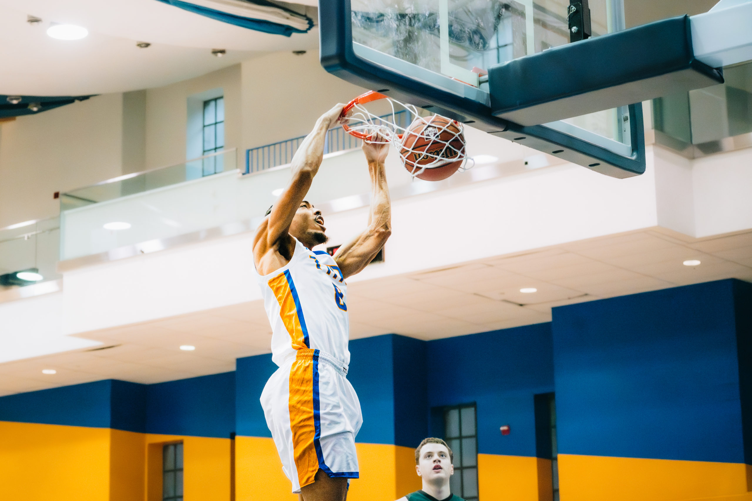TMU player goes for a two handed dunk