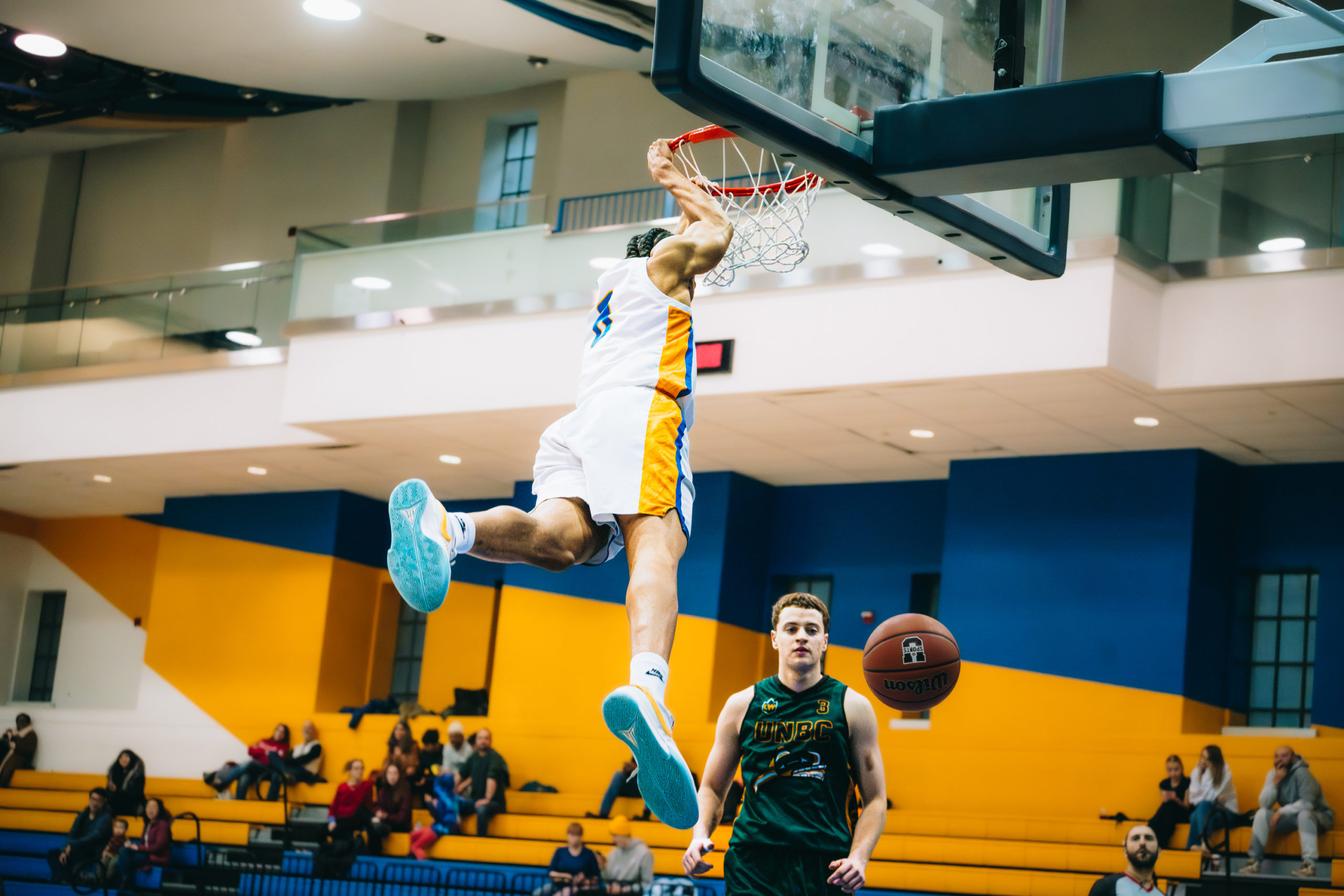 TMU player goes for a two handed dunk