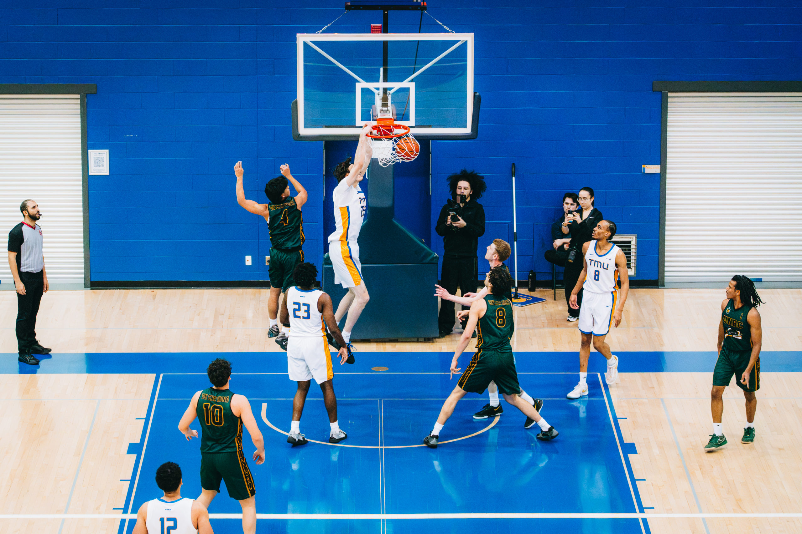 TMU player goes for a two handed dunk