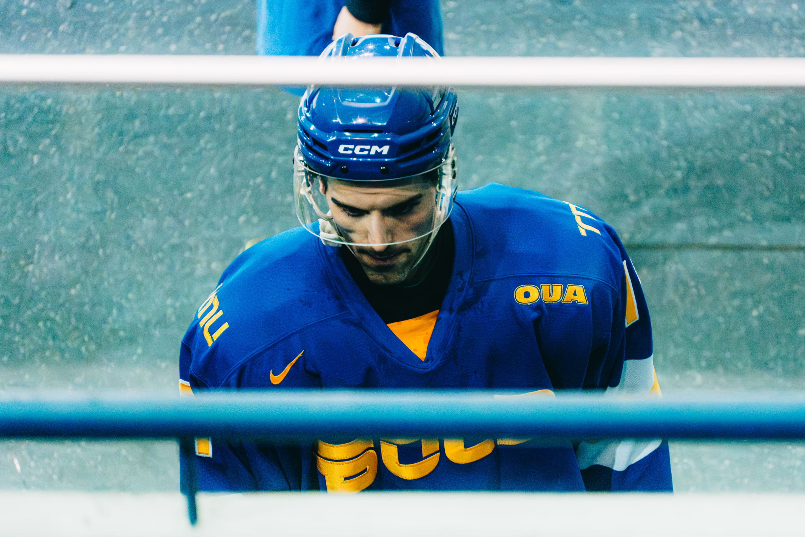 TMU Bold men's hockey player walking into the players' tunnel at the Mattamy Athletic Centre