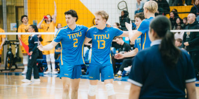 TMU huddles together after a point