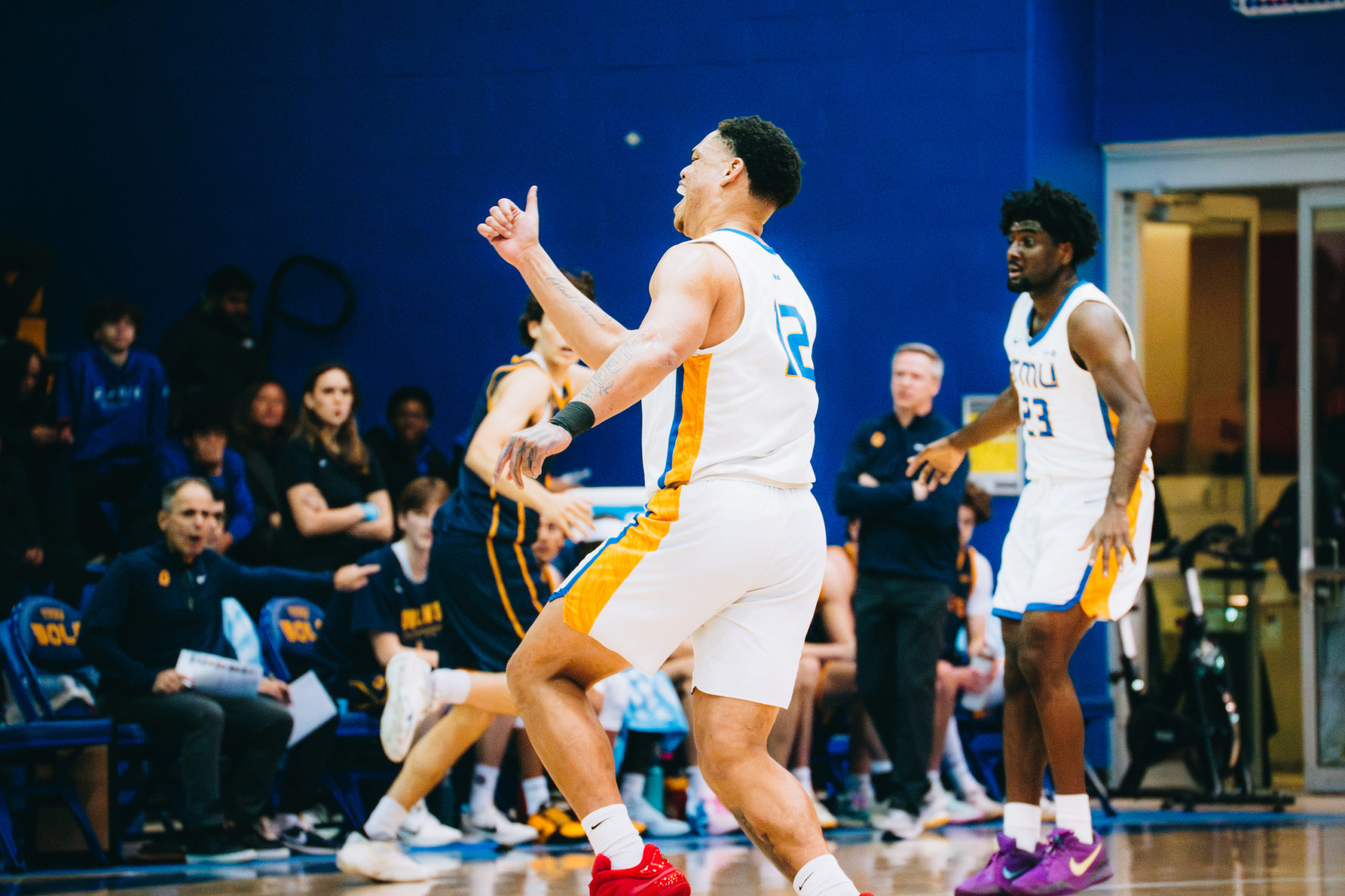 Aaron Rhooms celebrates a point