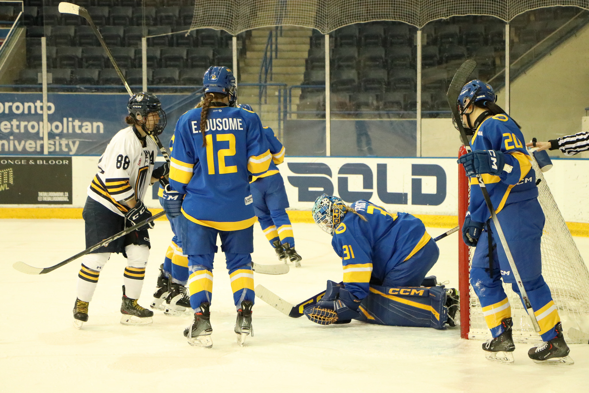 TMU saves a shot and protects their net