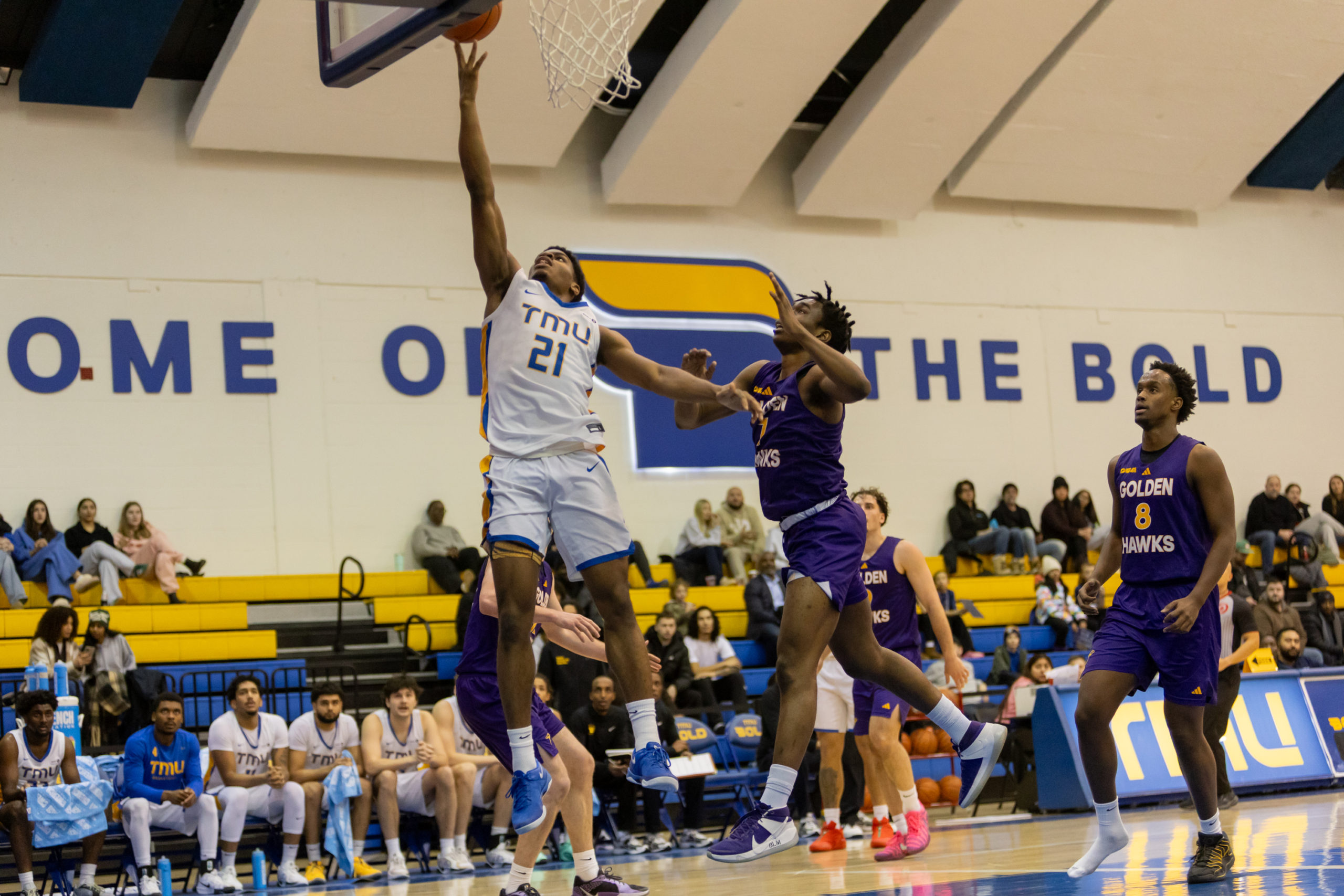 TMU PLAYER ATTEMPTS LAYUP