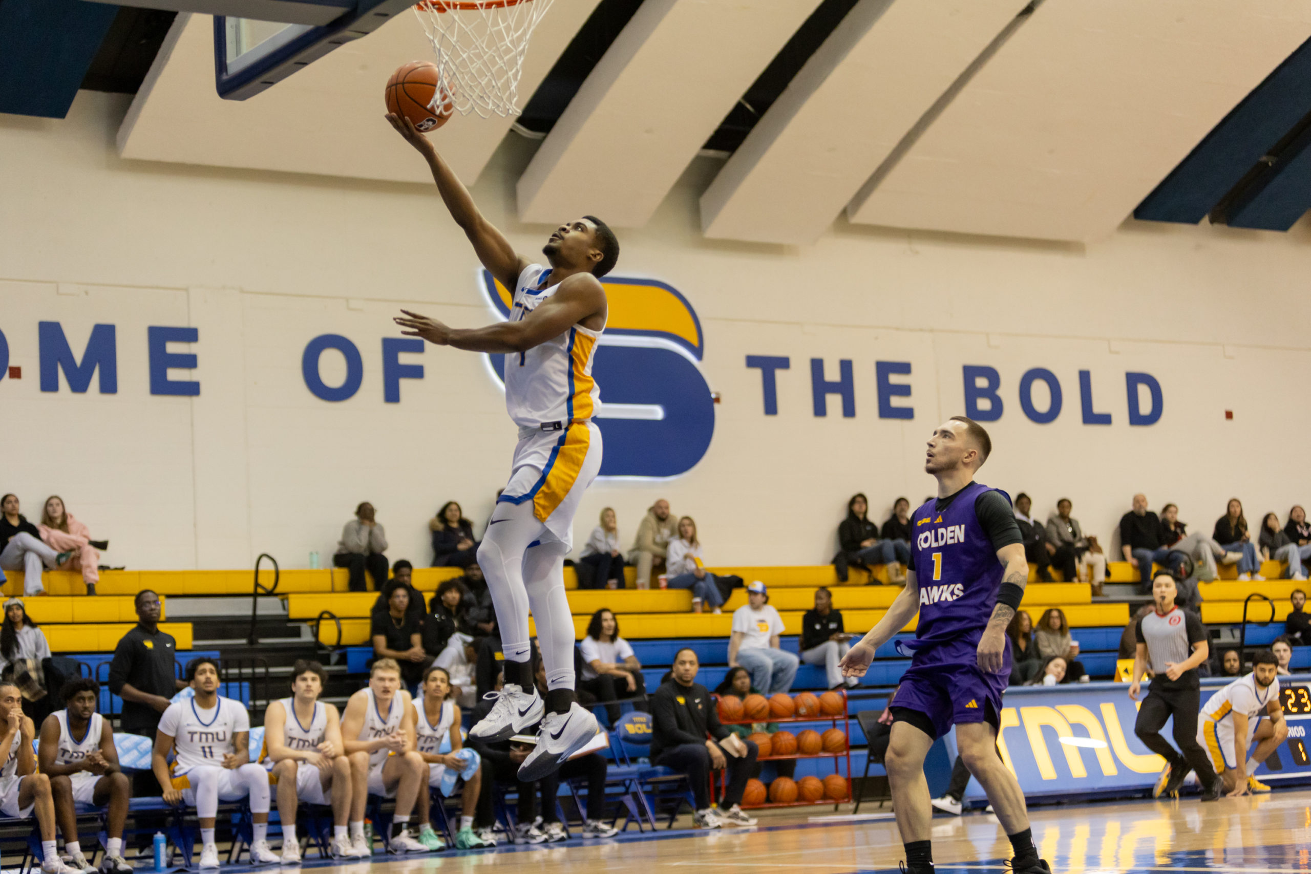 TMU PLAYER ATTEMPTS LAYUP