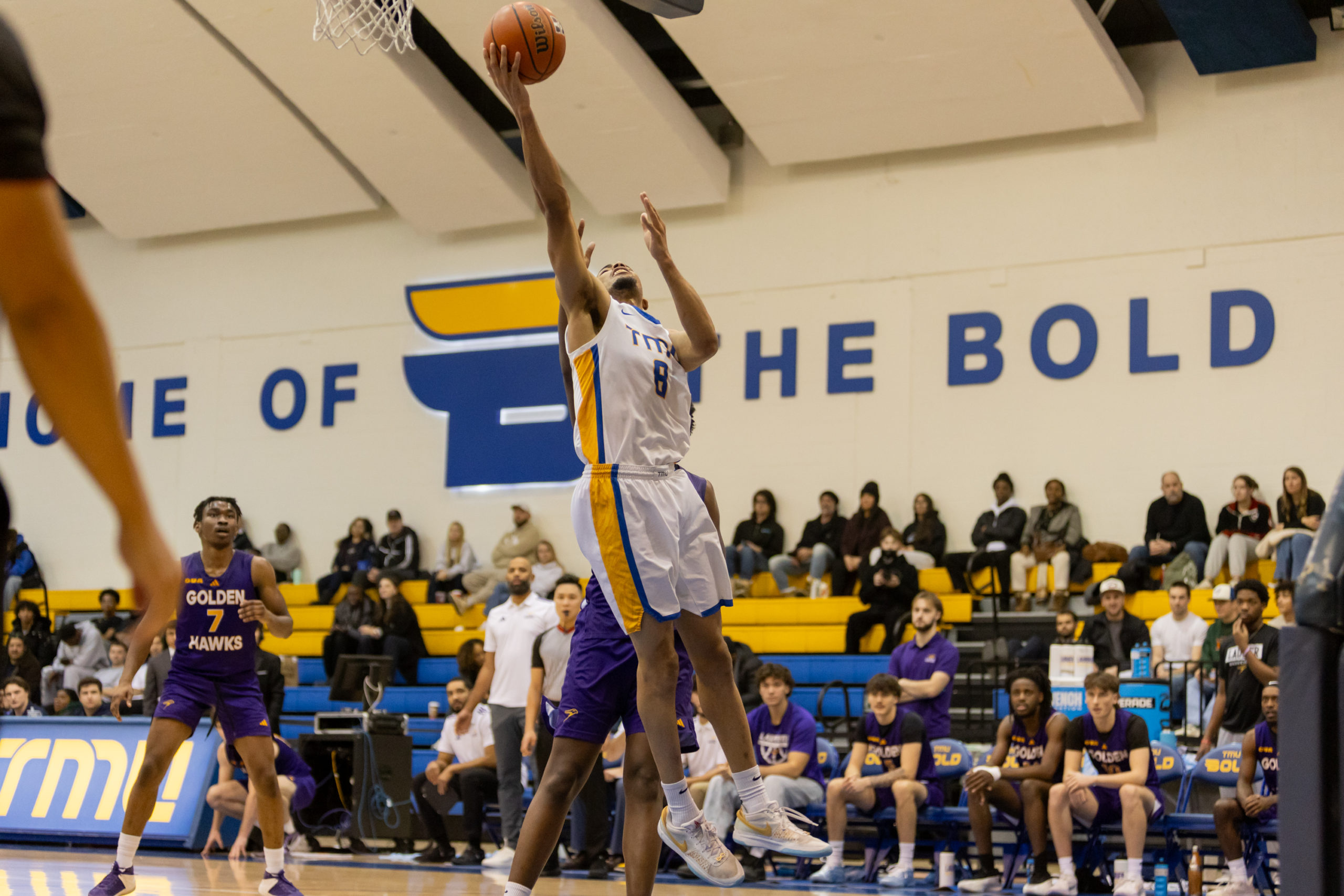TMU PLAYER ATTEMPTS LAYUP