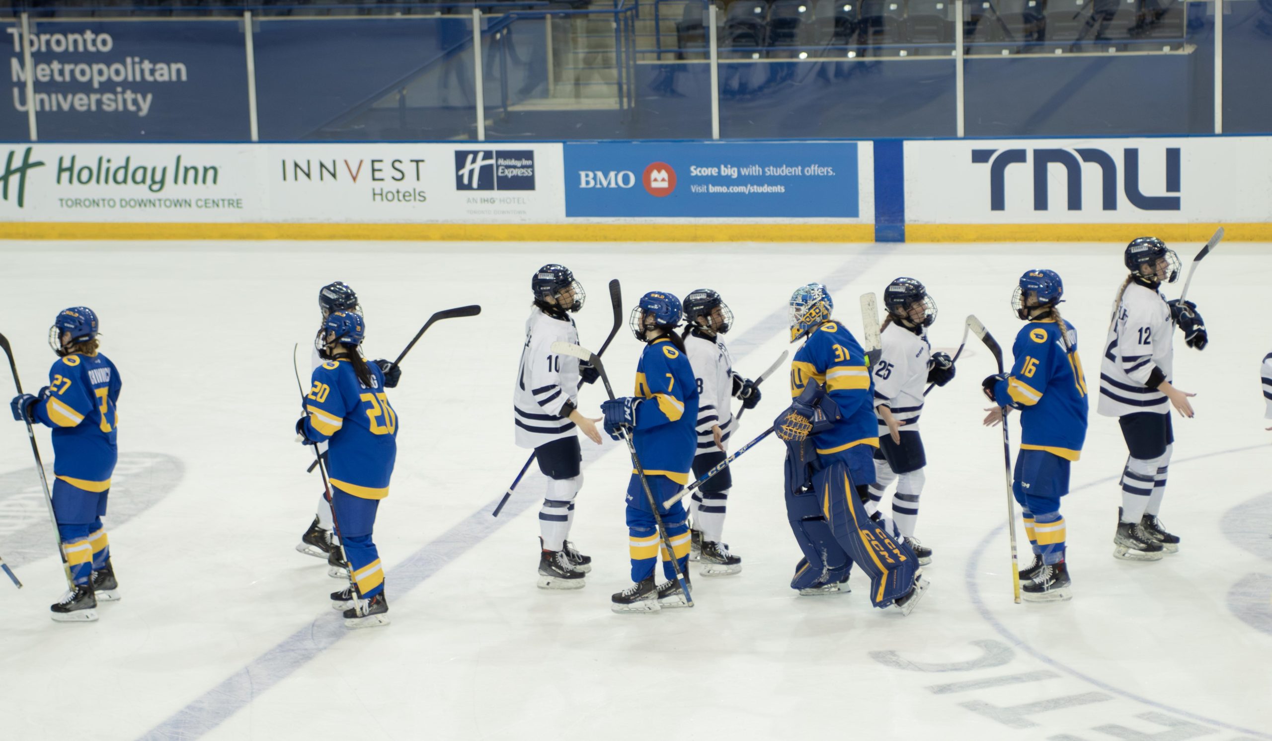 TMU and U of T shake hands post-game
