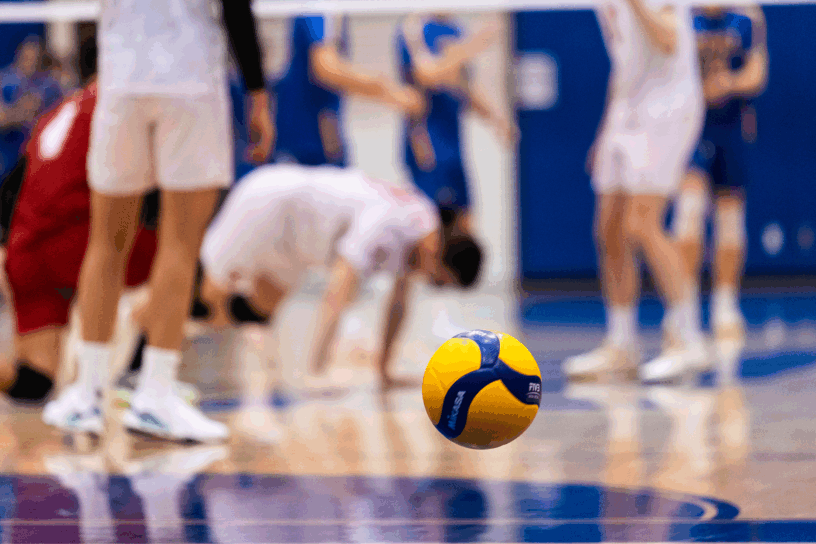 A volleyball bounces on RMC's side of the court as the team after TMU gains a point