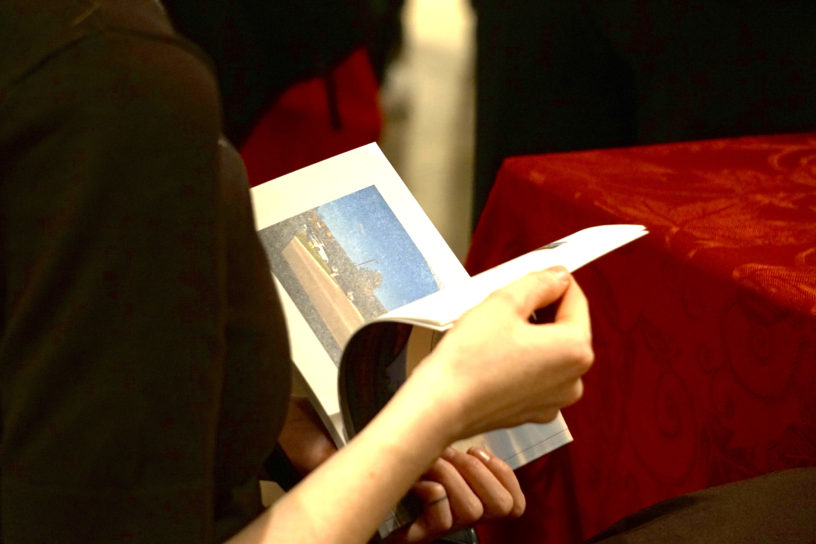 Someone flipping through a book.