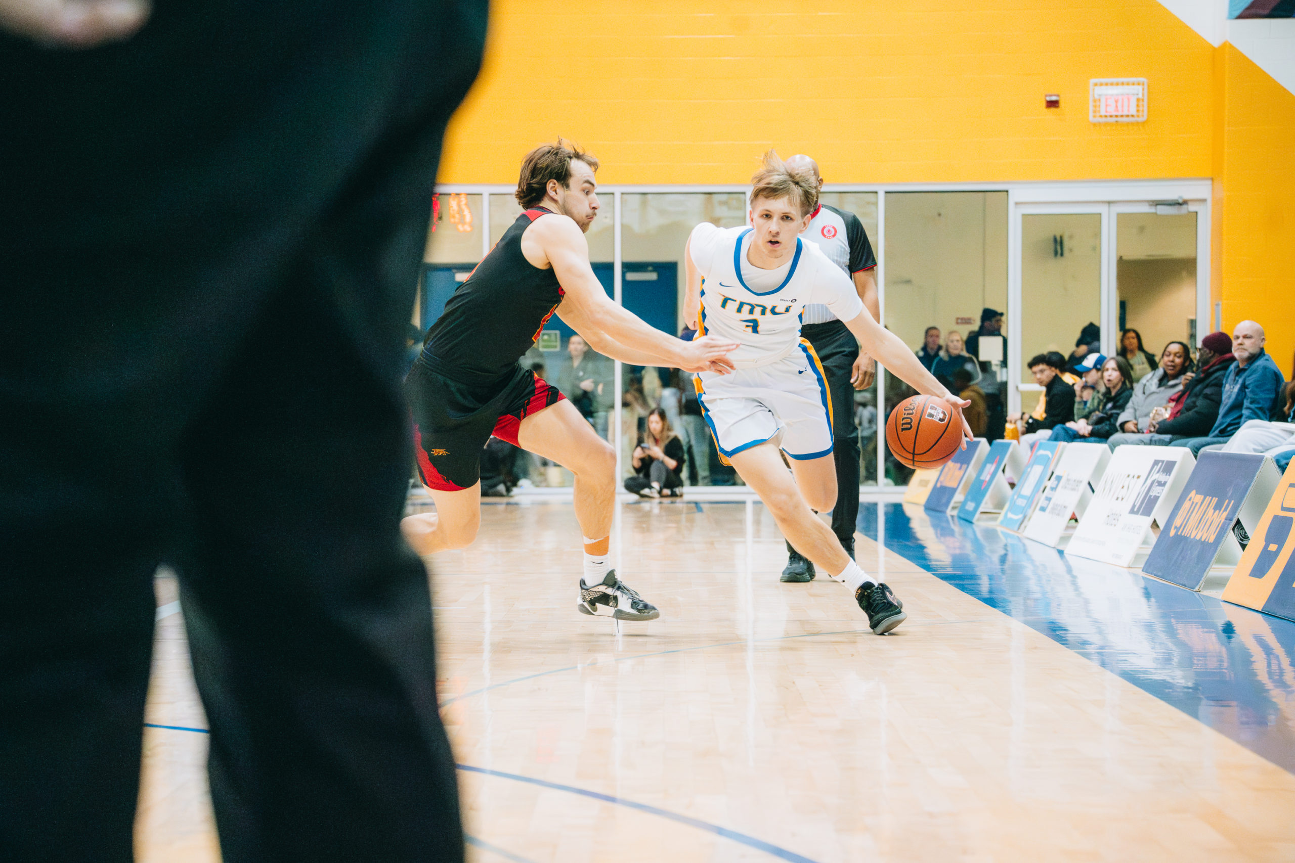A TMU player maintains possession as he gets closer to Guelph's net