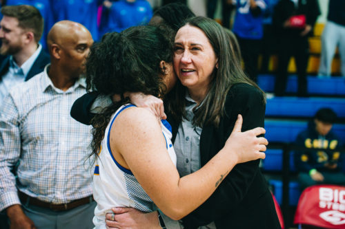 Carly Clarke and Kait Nichols share an emotional hug after securing the Critelli Cup