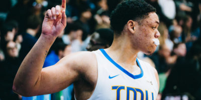 Aaron Rhooms signals a message to his team with his pointer finger