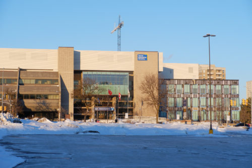 A wide shot of the TMU School of Medicine building.