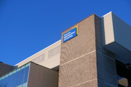 The outside of the TMU School of Medicine building. The TMU logo is visible.
