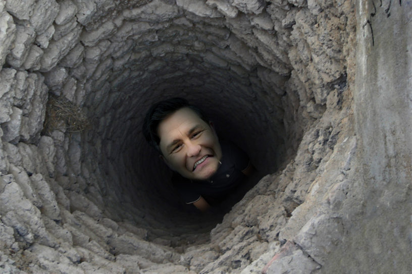 Pierre Poilievre looking up from the bottom of a water well.