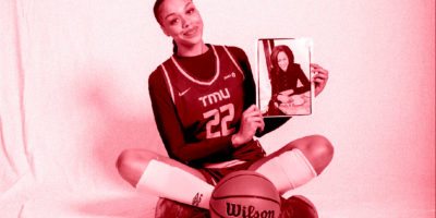 An image of Eternati Willock sitting down with a basketball and a photo on a white backdrop with a red hue over her.