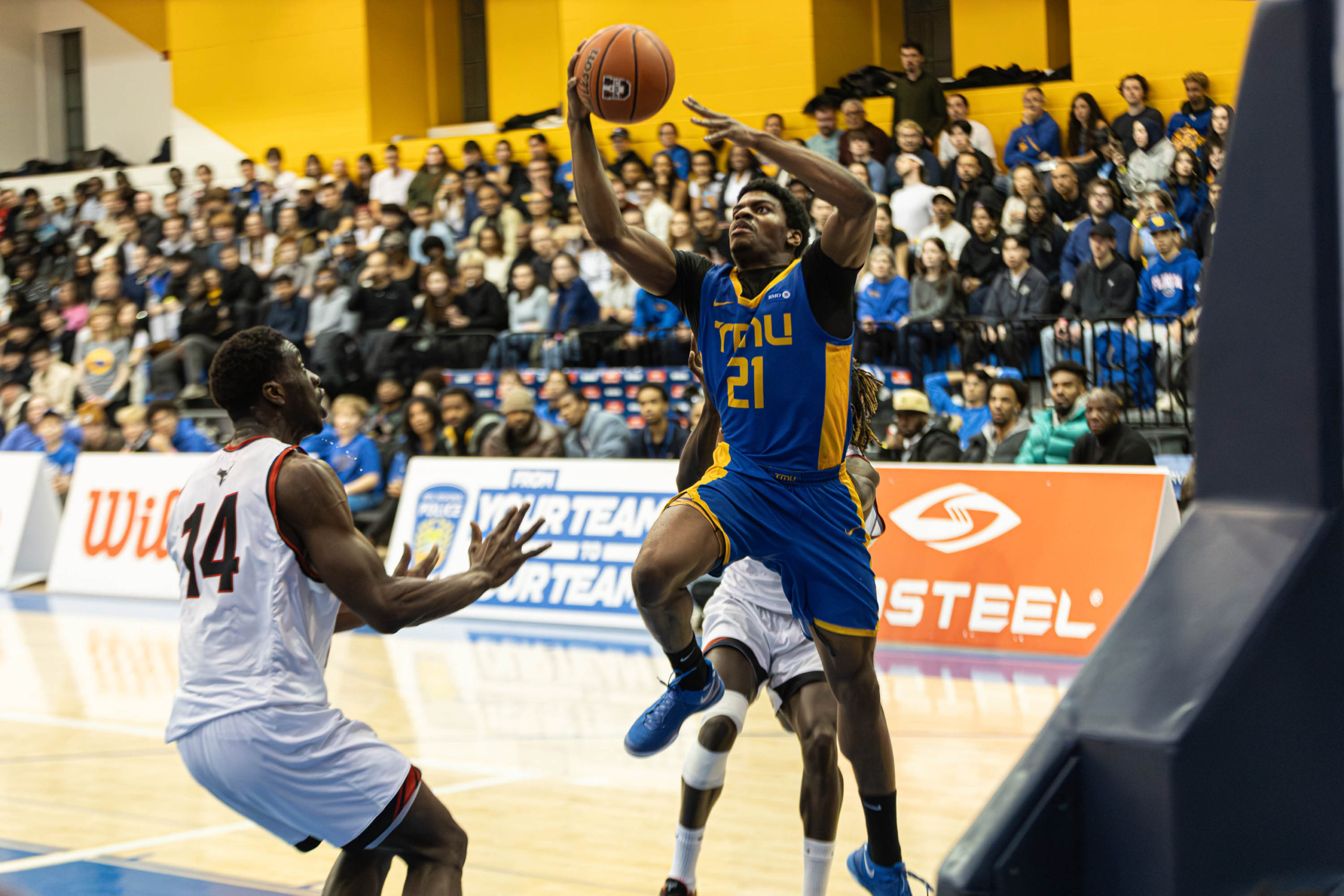 Gabriel Gutsmore goes up for a right-hand layup at the Mattamy Athletic Centre