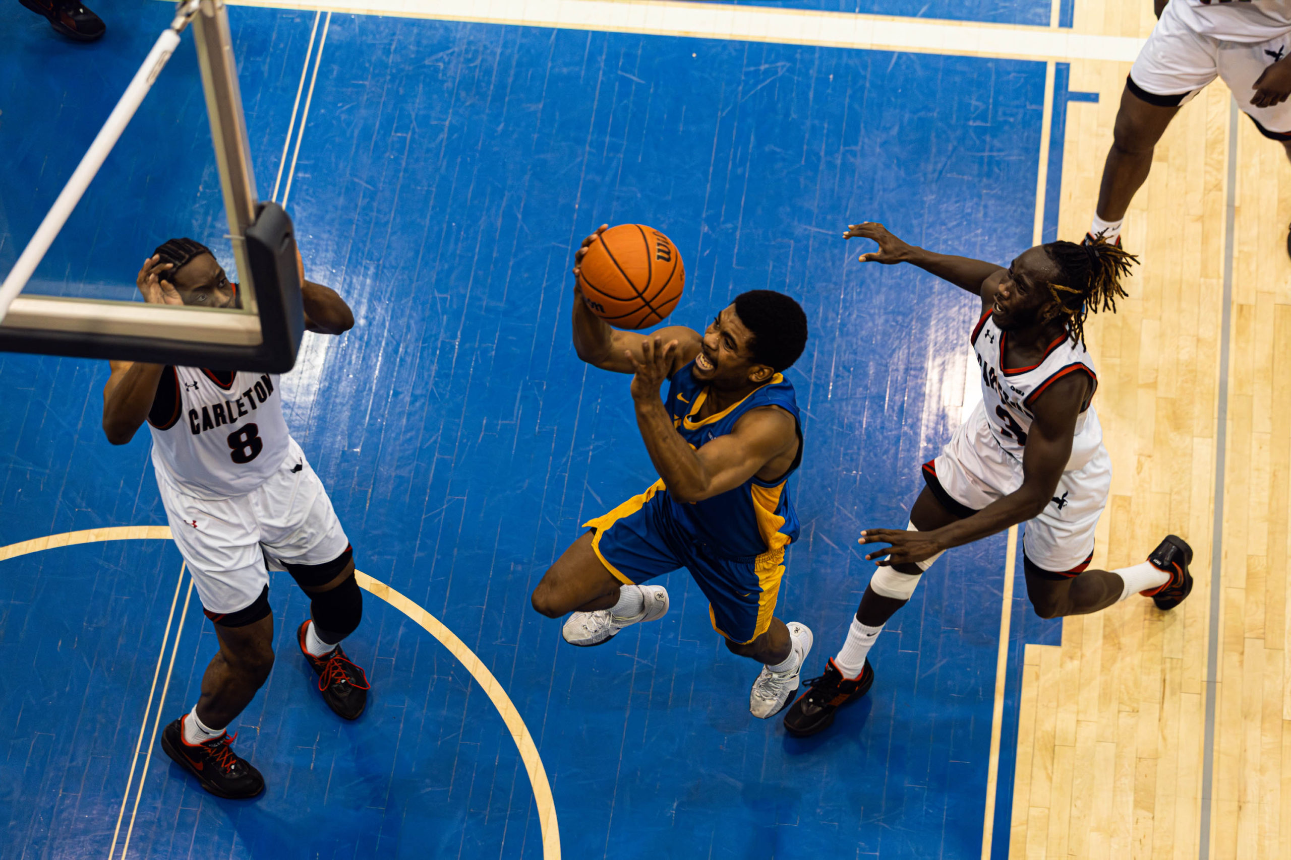 Maxime Louis-Jean goes up for a right-hand layup at the Mattamy Athletic Centre