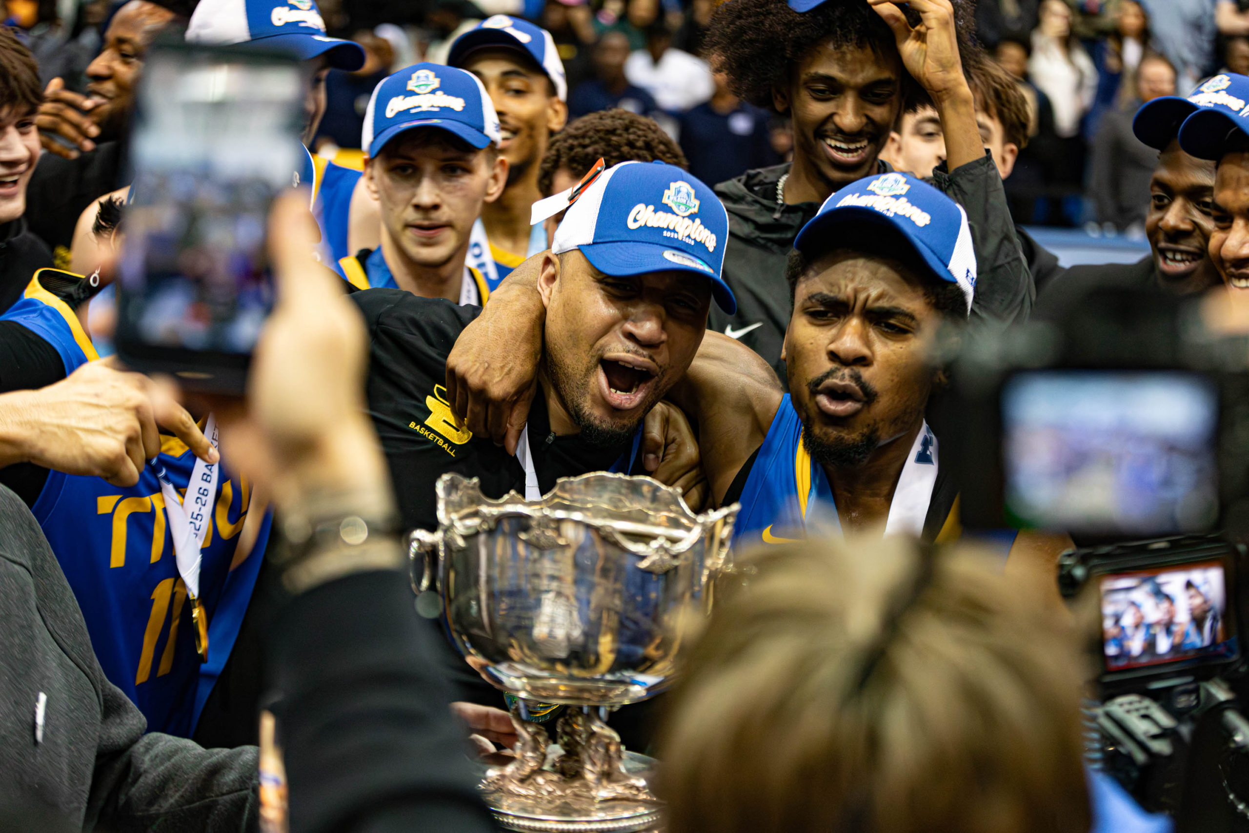 TMU Bold men's basketball team celebrate their 2026 Wilson Cup championship at the Mattamy Athletic Centre