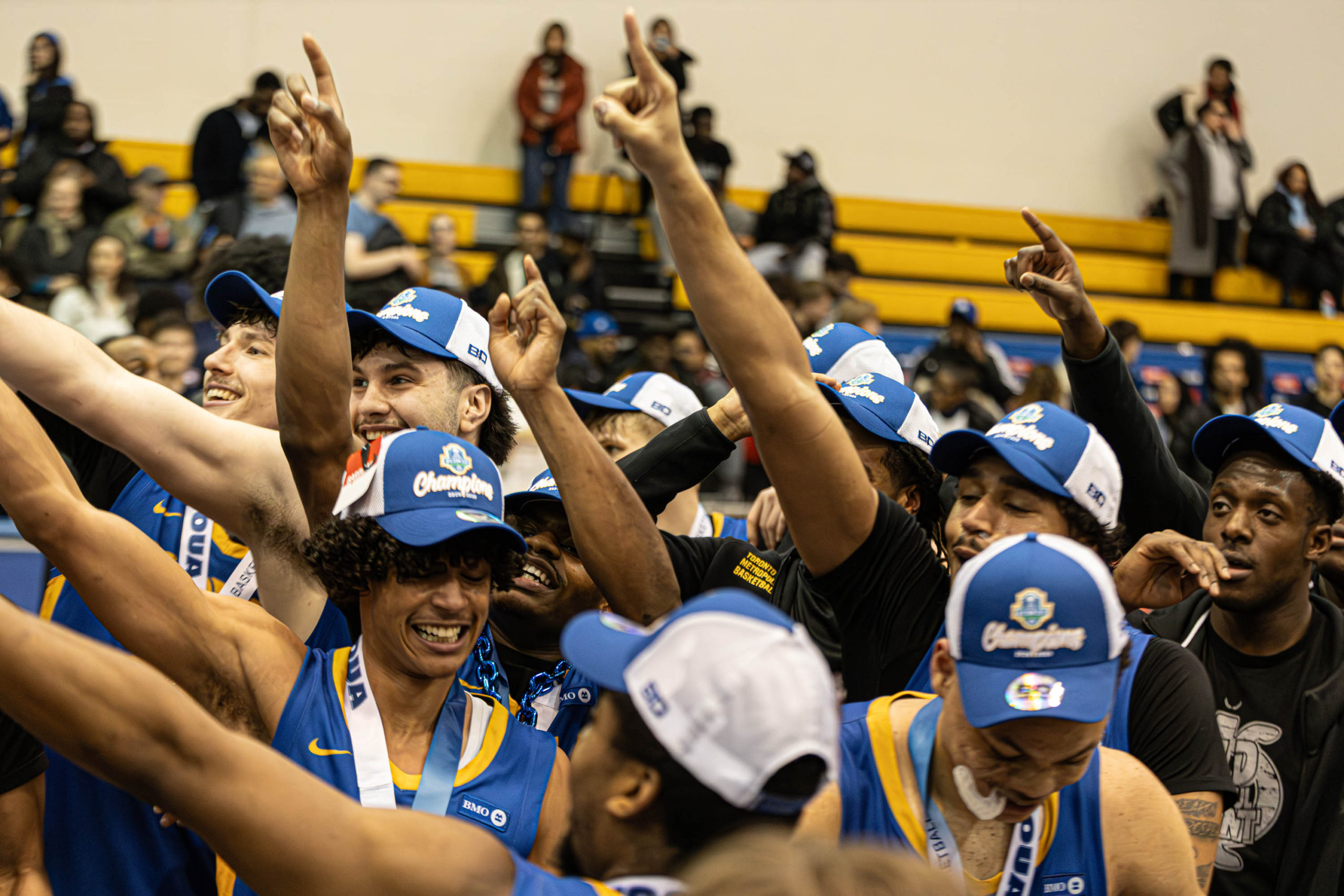 TMU Bold men's basketball team celebrate their 2026 Wilson Cup championship at the Mattamy Athletic Centre