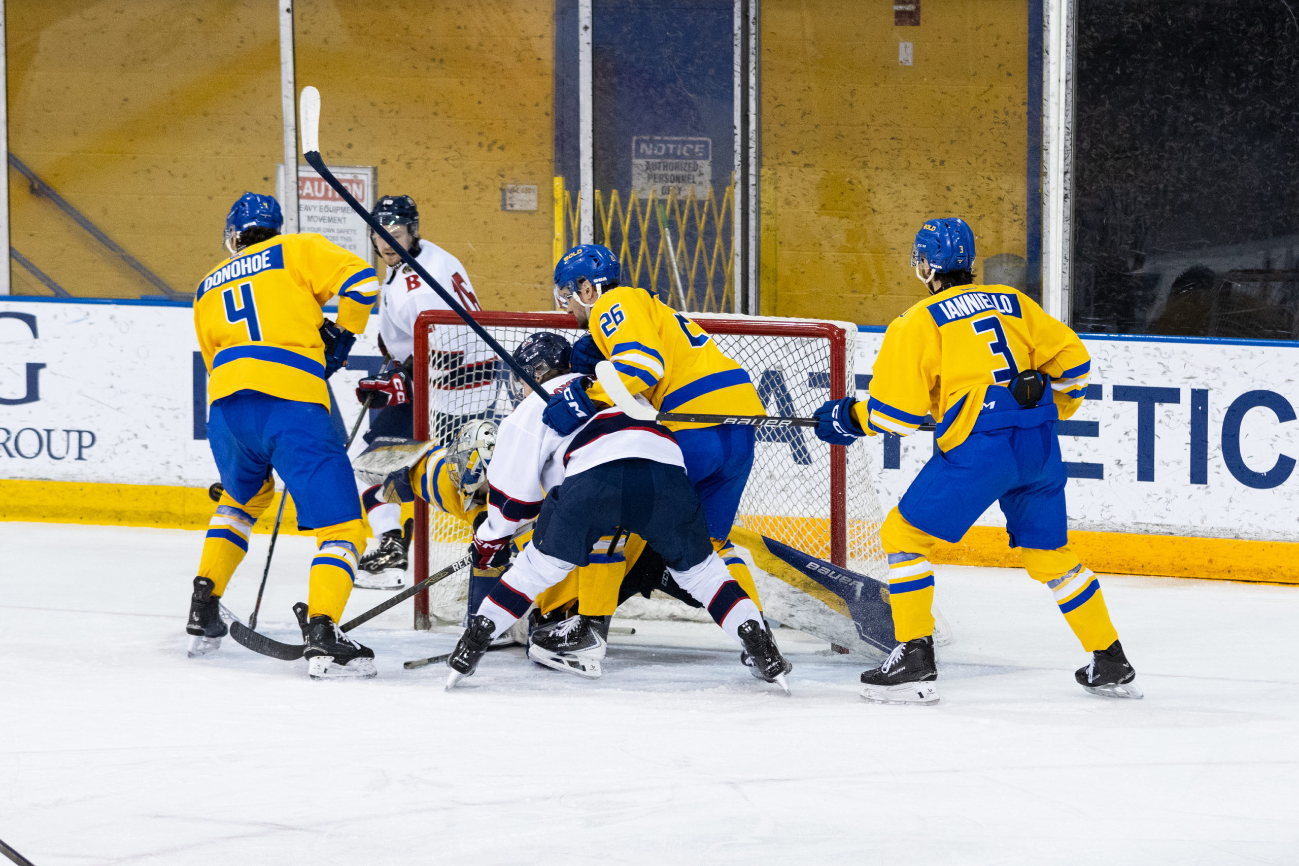 TMU's net gets scrappy, as TMU and Brock players get physical in front of TMU's goaltender