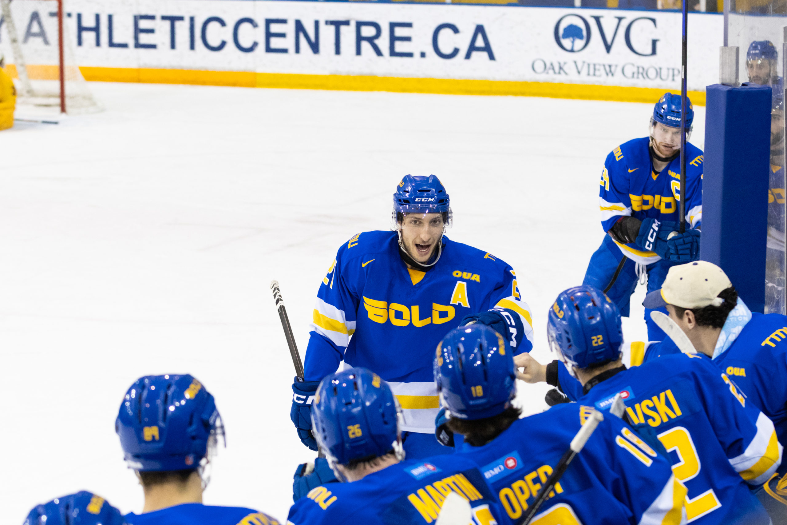 Will Portokalis leads the lineup to the bench, celebrating his goal with fistbumps