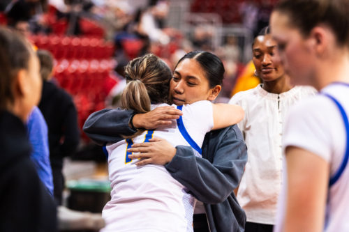 Catrina Garvey giving an individual a hug