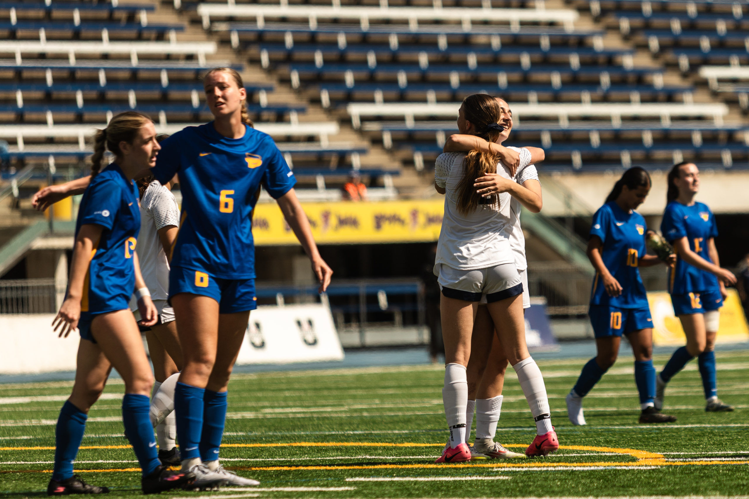 Varsity Blues celebrate on the pitch as frustration rises amongst the Bold.