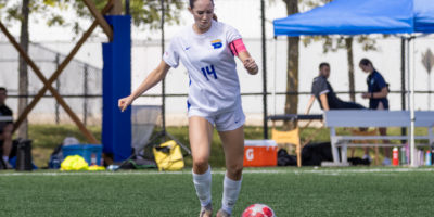 Bold midfielder, Natalie Moynihan prepares to strike the ball.