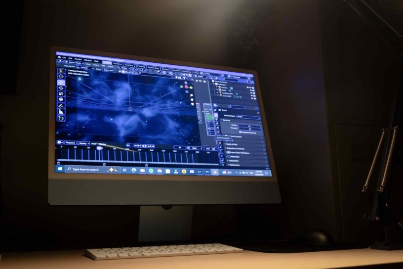 Picture of a monitor with a screen showing a VFX software interface.