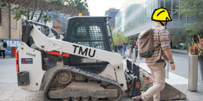 A photo of a bulldozer on Gould Street at Toronto Metropolitan University.