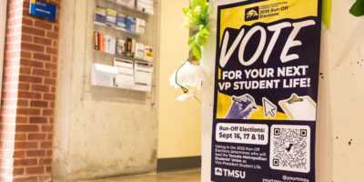Picture of a poster which reads "VOTE FOR YOUR NEXT VP STUDENT LIFE".