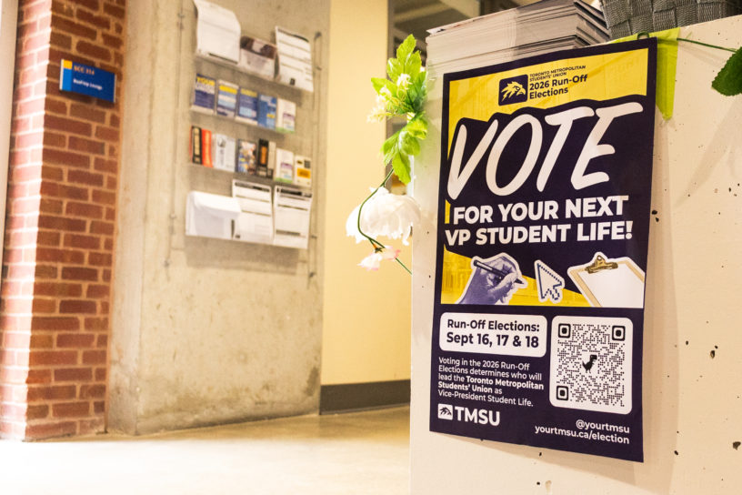 Picture of a poster which reads "VOTE FOR YOUR NEXT VP STUDENT LIFE".